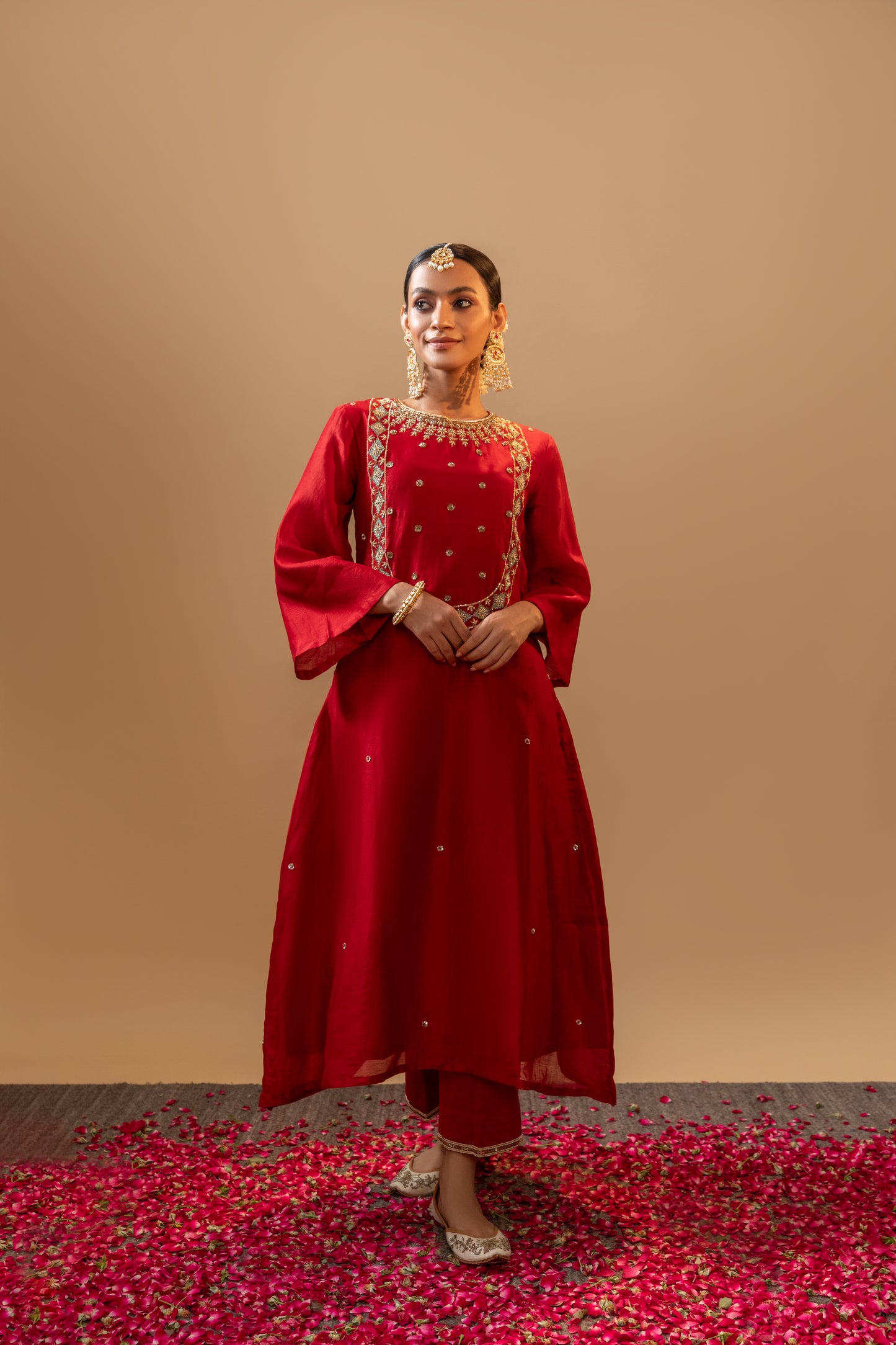 Red Hand-Embroidered Silk Kurta Set in Banarasi Silk chanderi with an organza dupatta with handmade tassels. Perfect for weddings and occasions.
