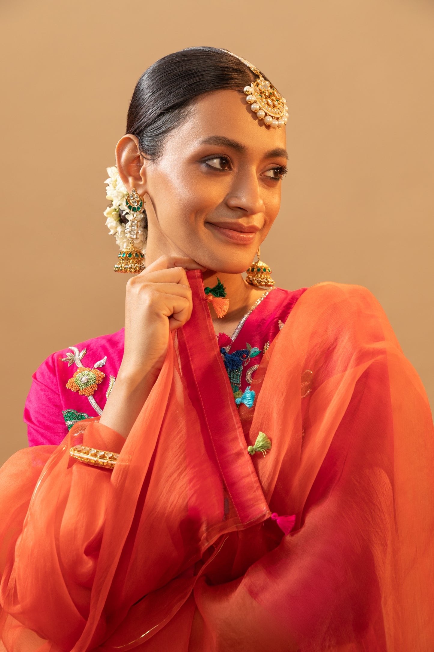 Peacock Style Hand-Embroidered Rani Pink Suit Set with Orange Dupatta for weddings