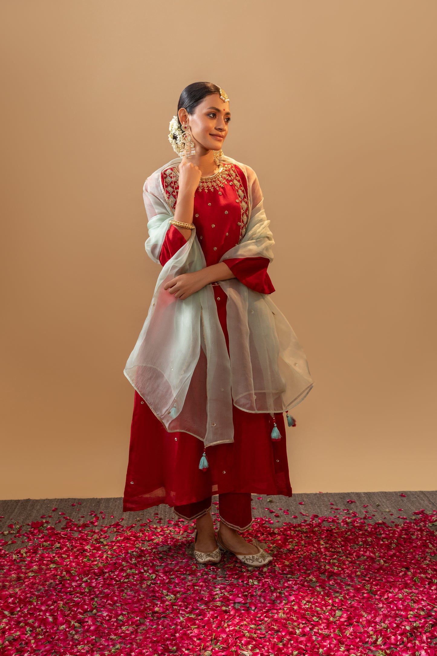 Red Hand-Embroidered Silk Kurta Set in Banarasi Silk chanderi with an organza dupatta with handmade tassels. Perfect for weddings and occasions.