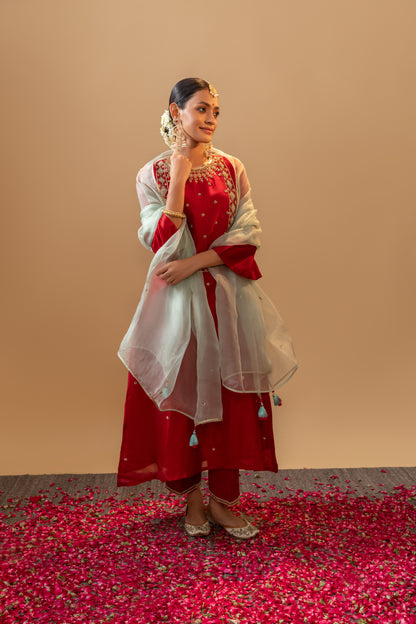 Red Hand-Embroidered Silk Kurta Set in Banarasi Silk chanderi with an organza dupatta with handmade tassels. Perfect for weddings and occasions.